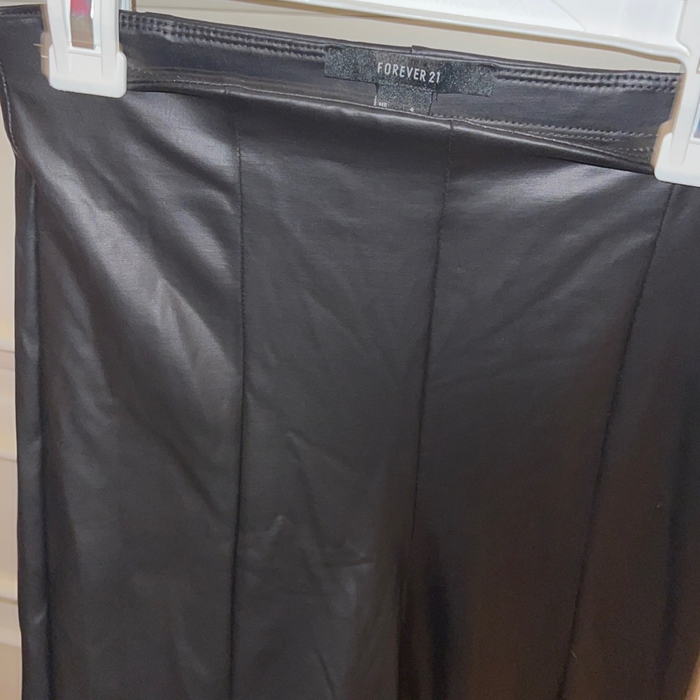 Leather pants never worn, but tags were taken off